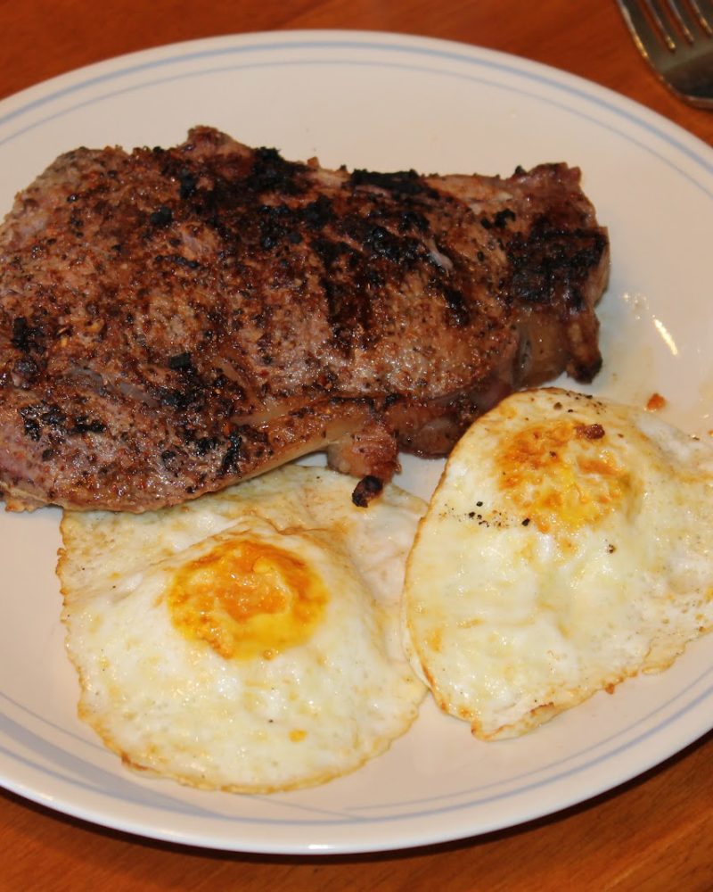Breakfast flank steak and eggs with guacamole